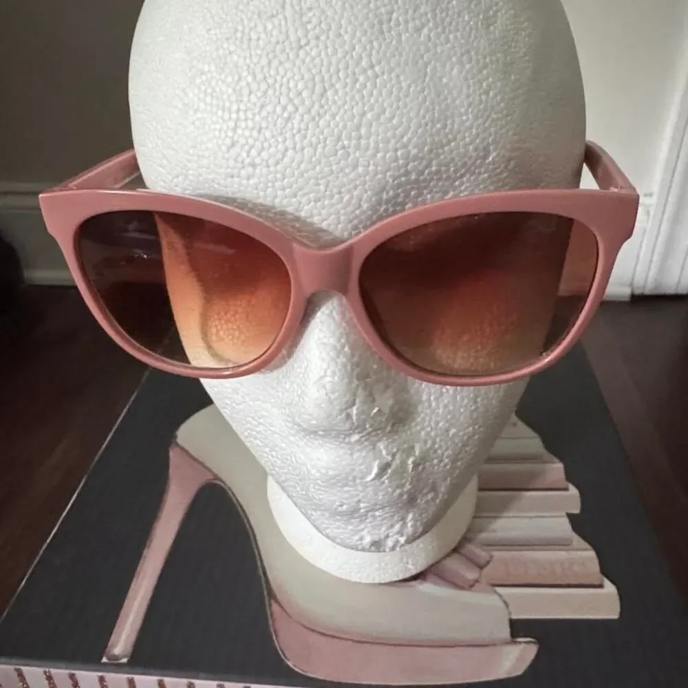 Pink sunglasses with brown lenses
